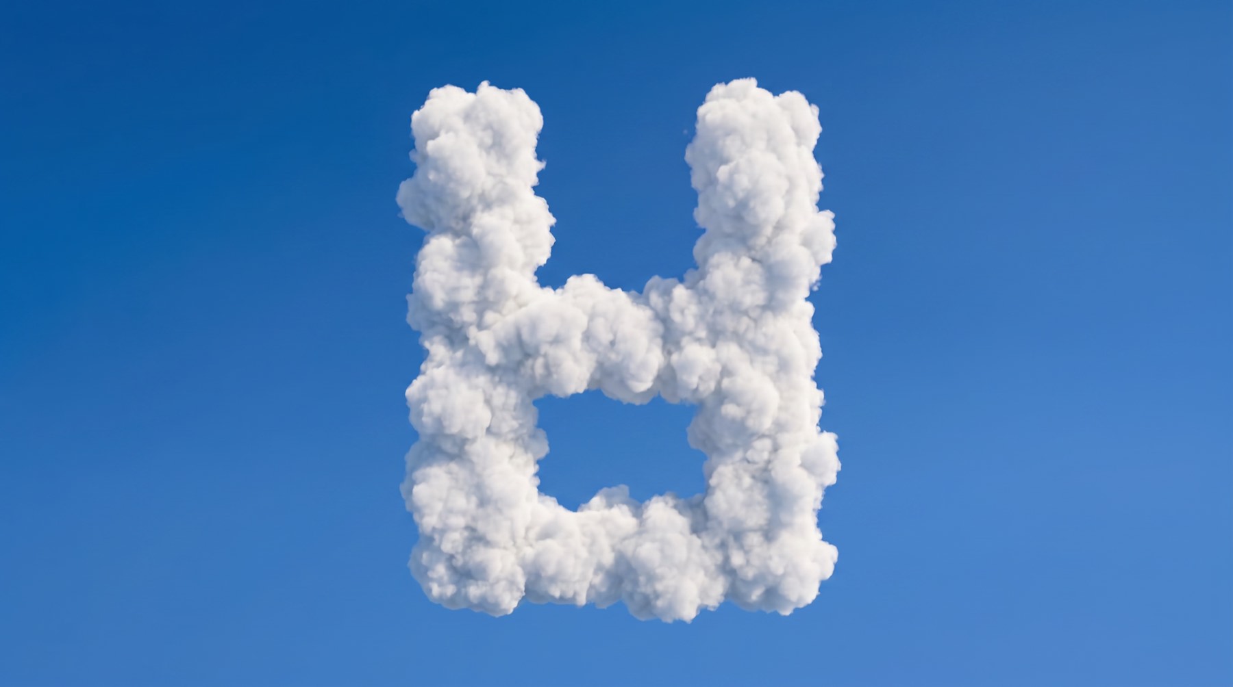 Das hundredlabs-H als Wolkenformation vor blauem Himmel